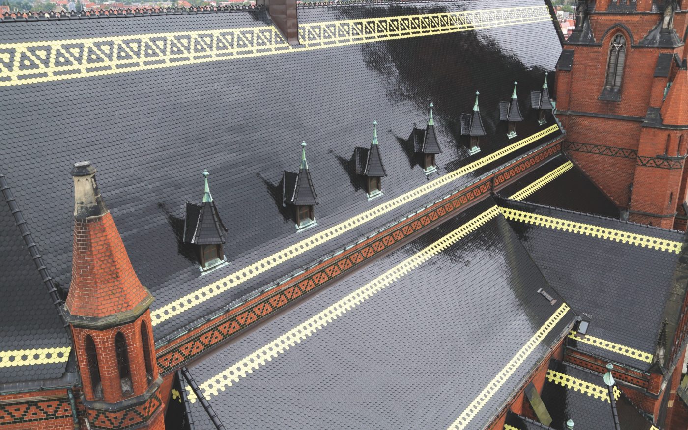 Cathedral Legnica Poland with glazed beaver black and yellow roof tile
