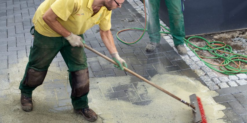 paver, penter, paving stone, brick, lay, laying, construction worker, broom, water, sand